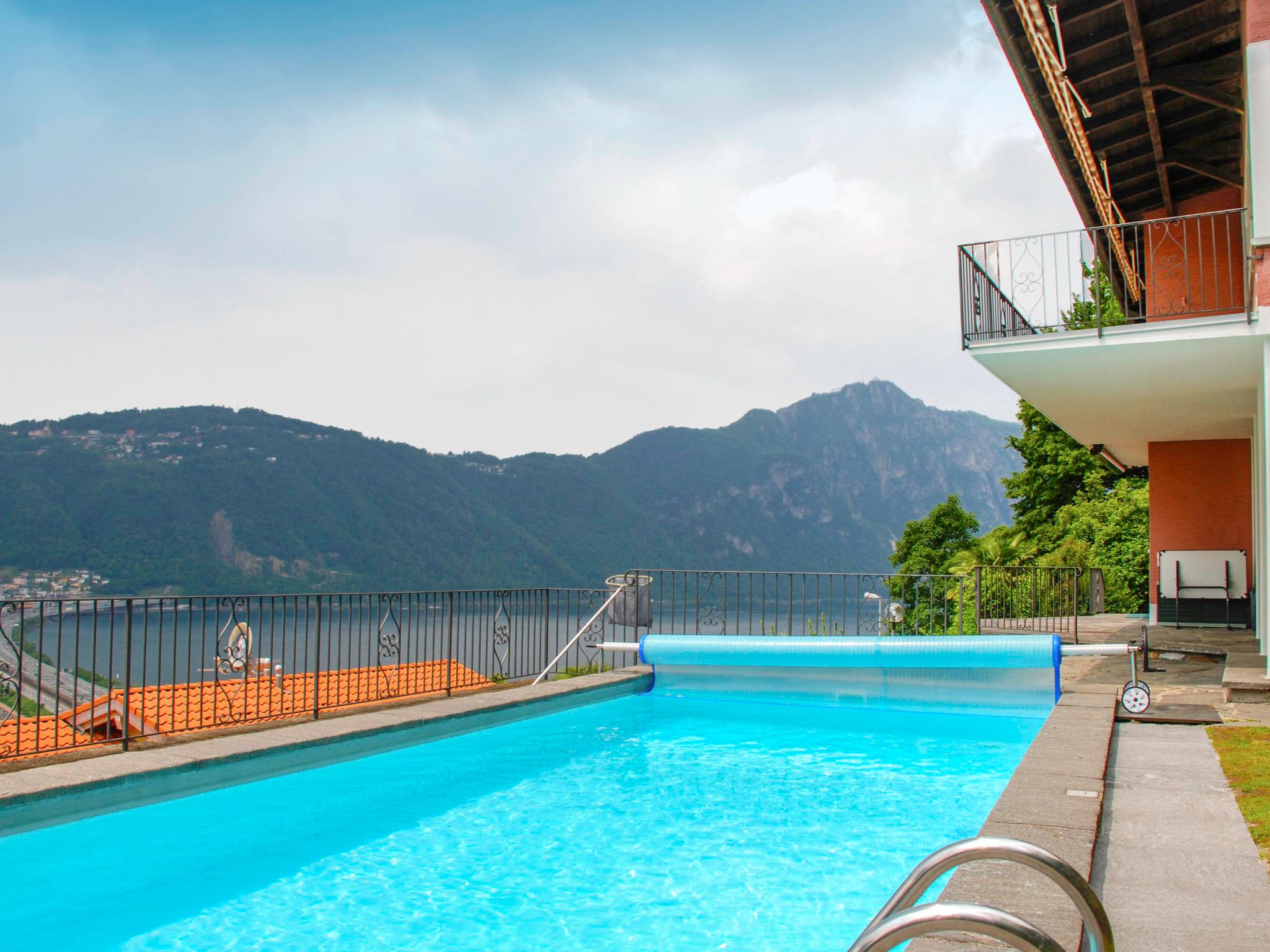 Foto 20 - Apartamento de 2 quartos em Bissone com piscina e vista para a montanha