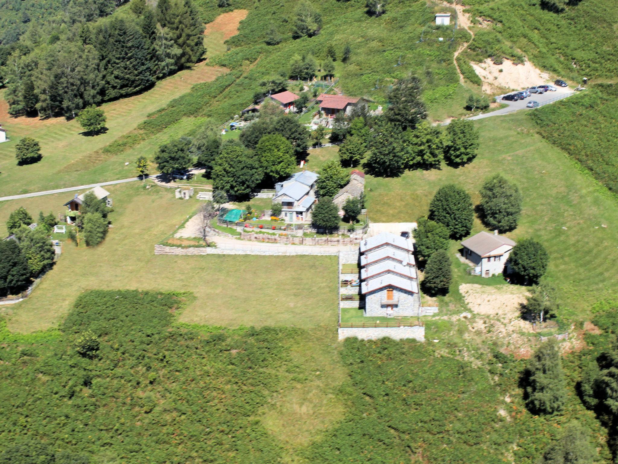 Foto 14 - Casa de 2 quartos em Peglio com jardim e vista para a montanha