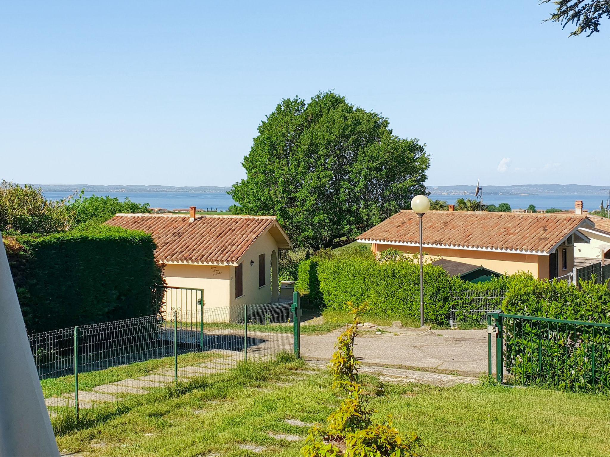 Photo 23 - Maison de 2 chambres à Bardolino avec piscine et jardin