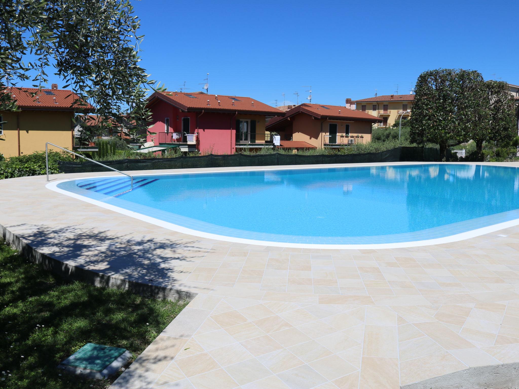 Foto 18 - Casa de 2 habitaciones en Bardolino con piscina y jardín