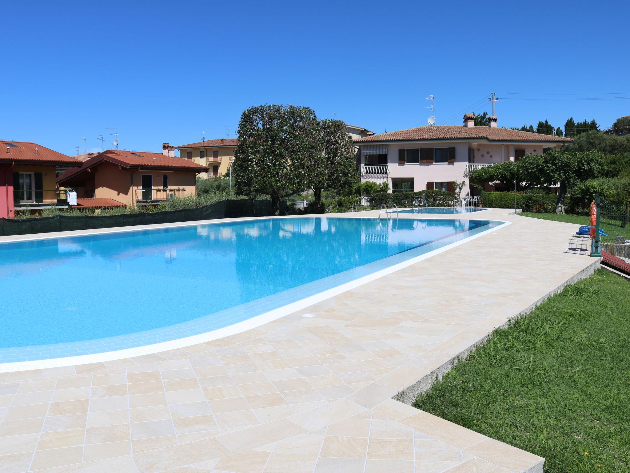 Photo 17 - 2 bedroom House in Bardolino with swimming pool and mountain view