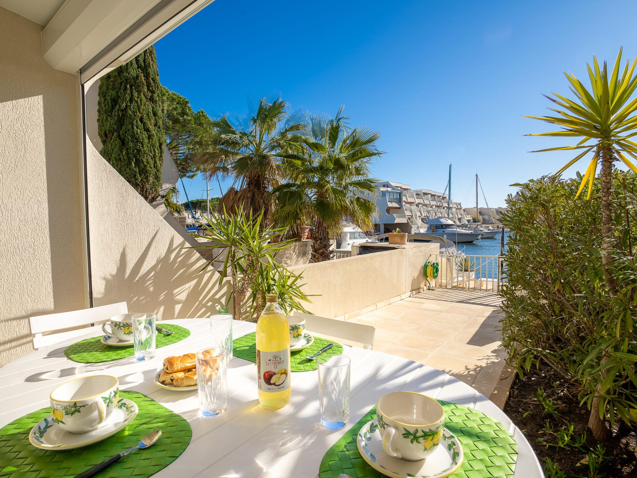 Foto 1 - Casa con 2 camere da letto a Le Grau-du-Roi con terrazza e vista mare