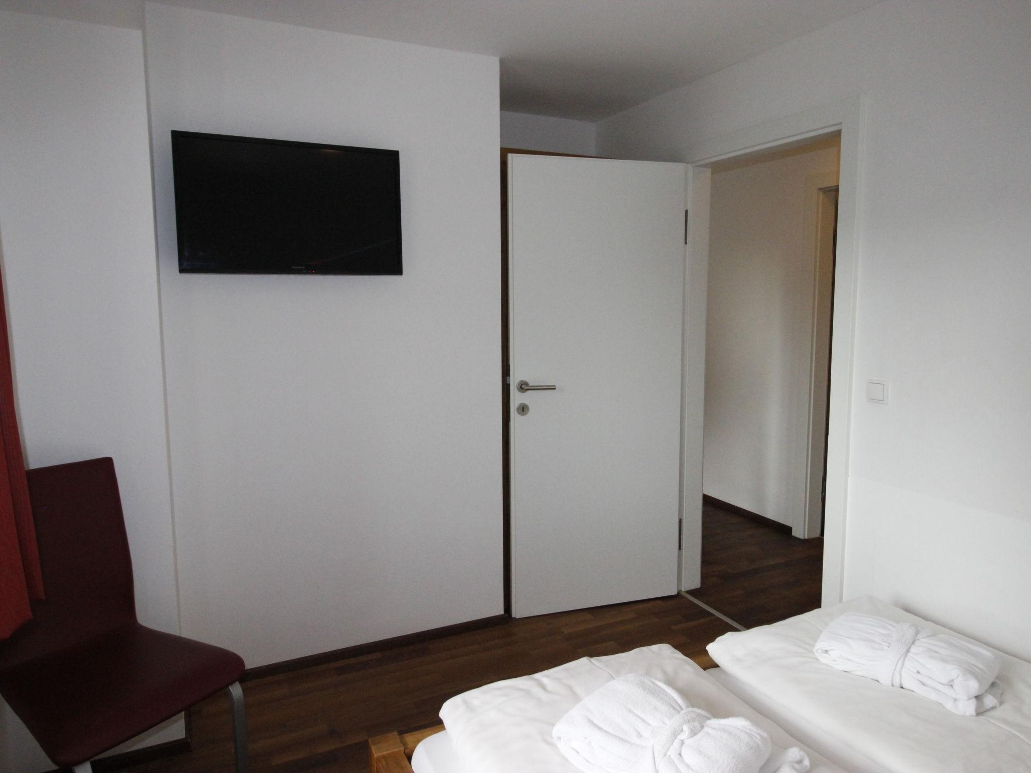 Foto 14 - Appartamento con 2 camere da letto a Kaprun con sauna e vista sulle montagne