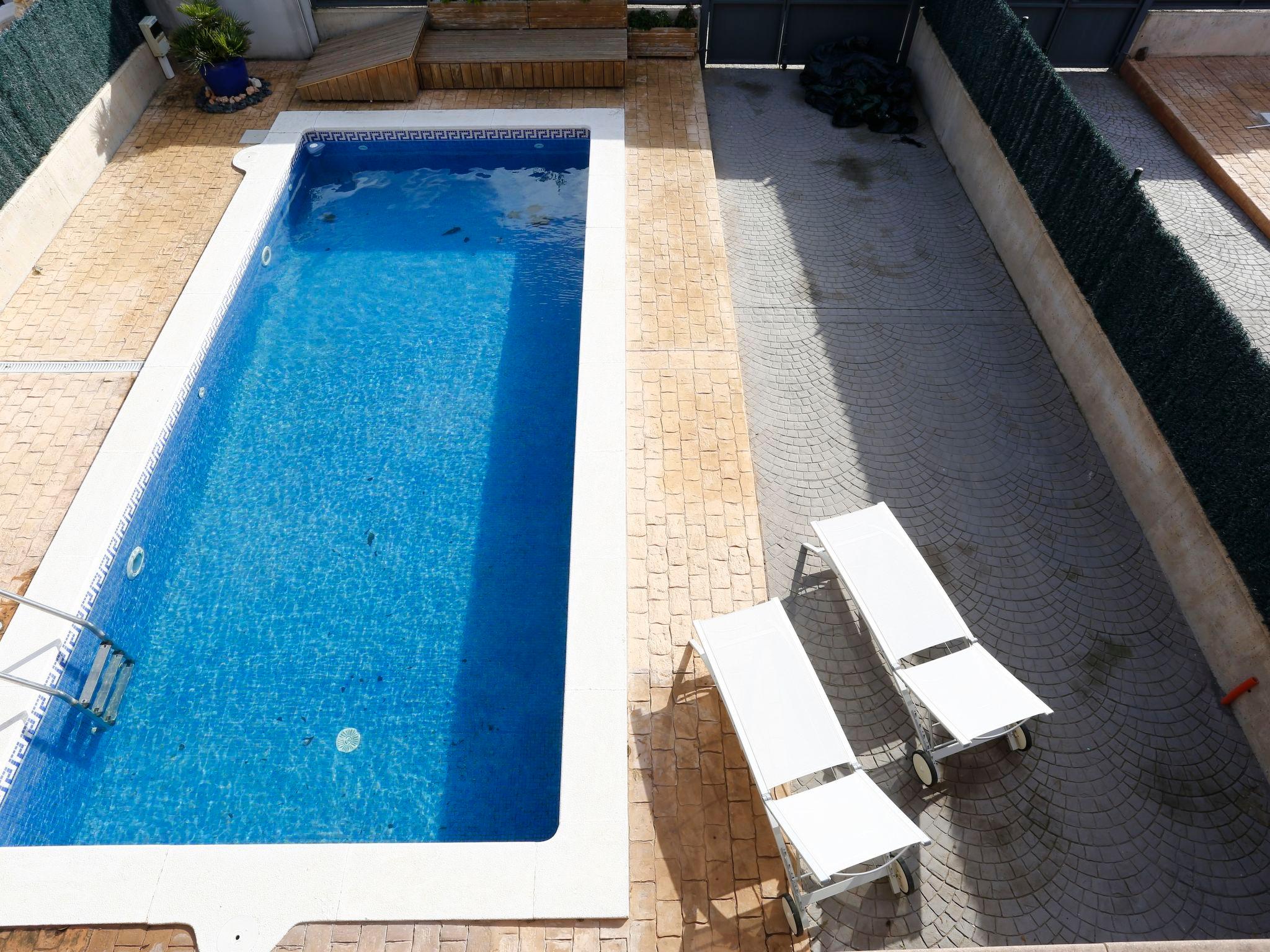 Foto 1 - Casa con 3 camere da letto a l'Ampolla con piscina privata e vista mare