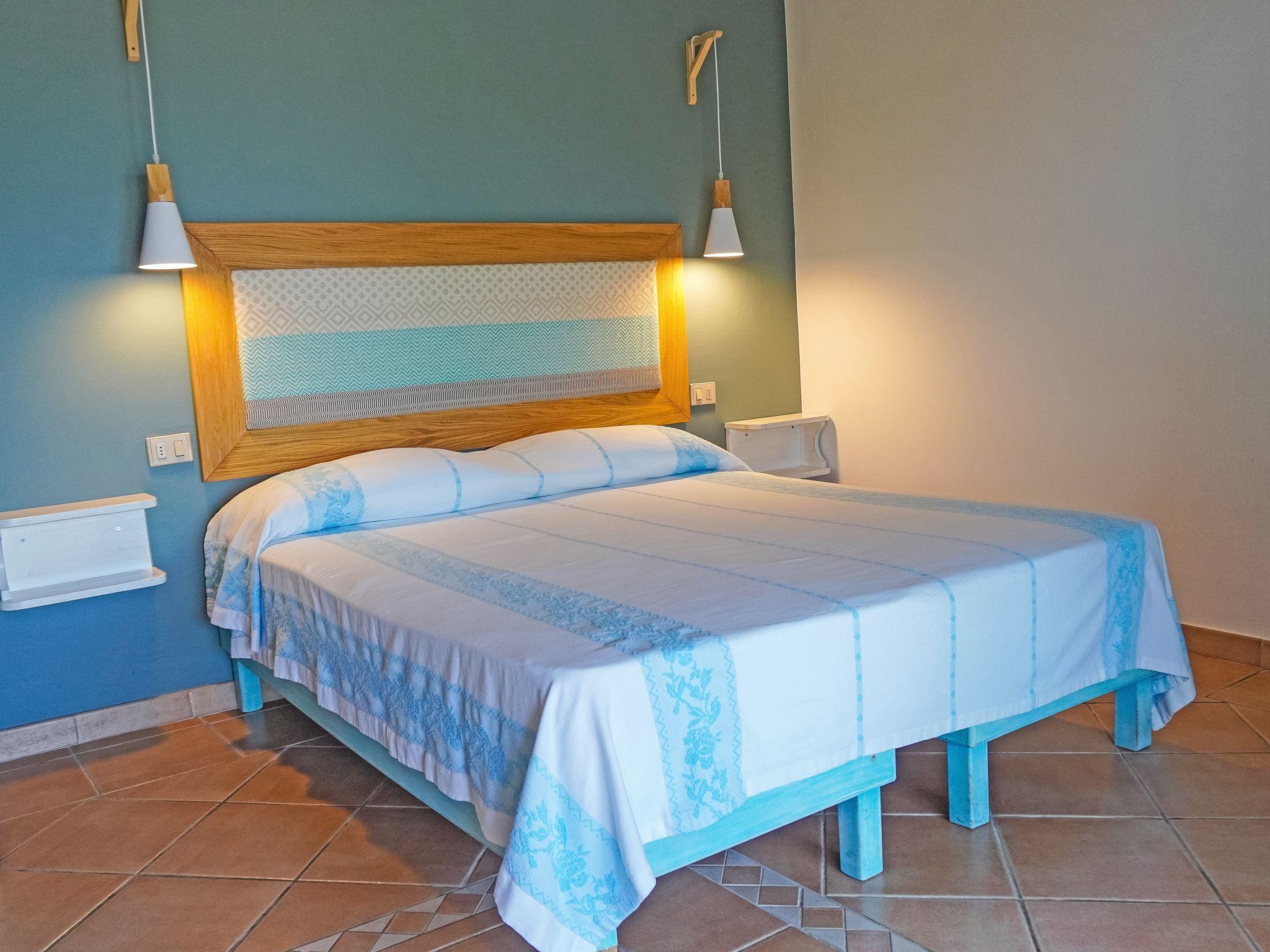 Foto 5 - Apartamento en San Teodoro con piscina y vistas al mar