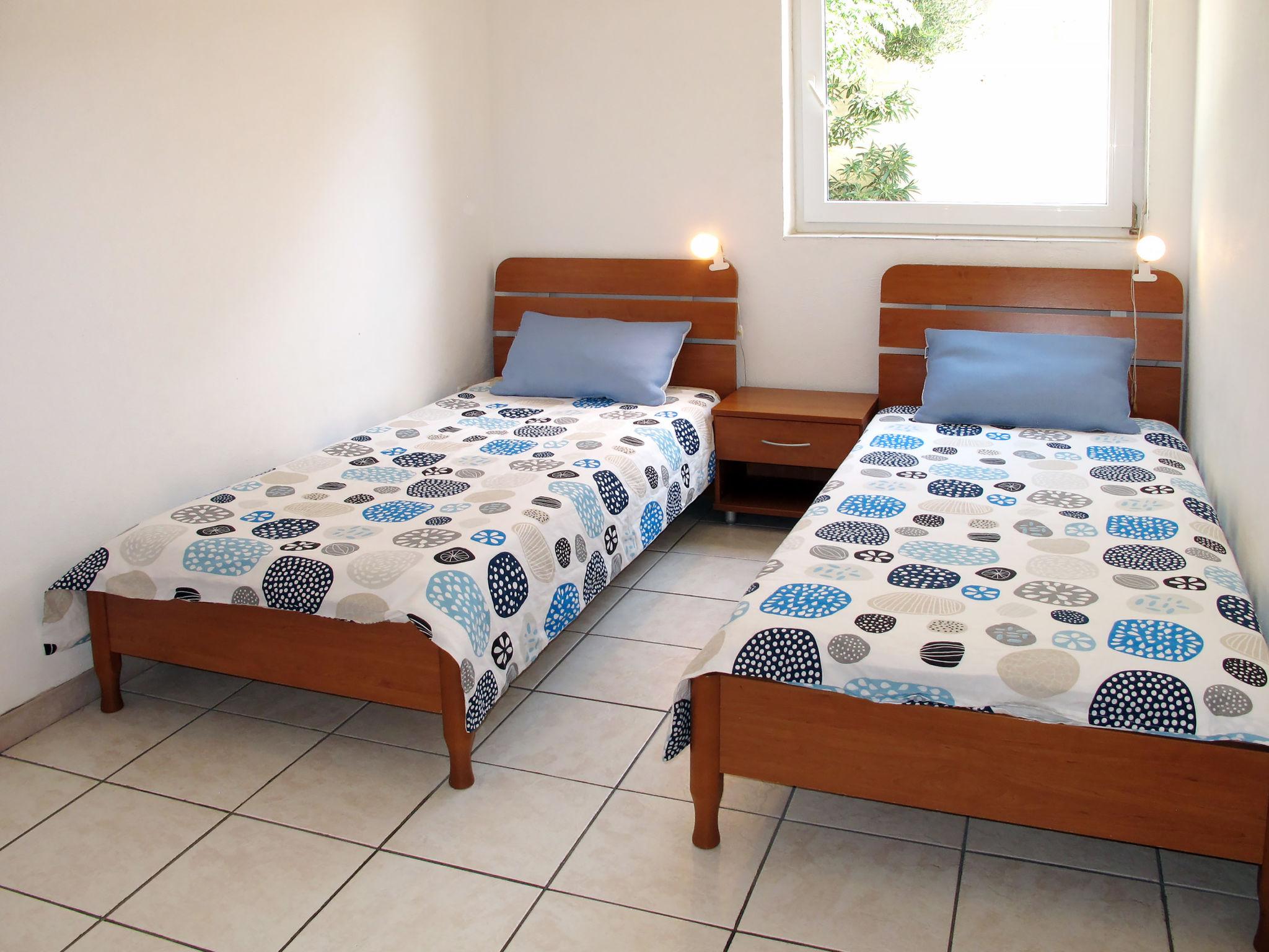 Foto 7 - Appartamento con 2 camere da letto a Rab con terrazza e vista mare