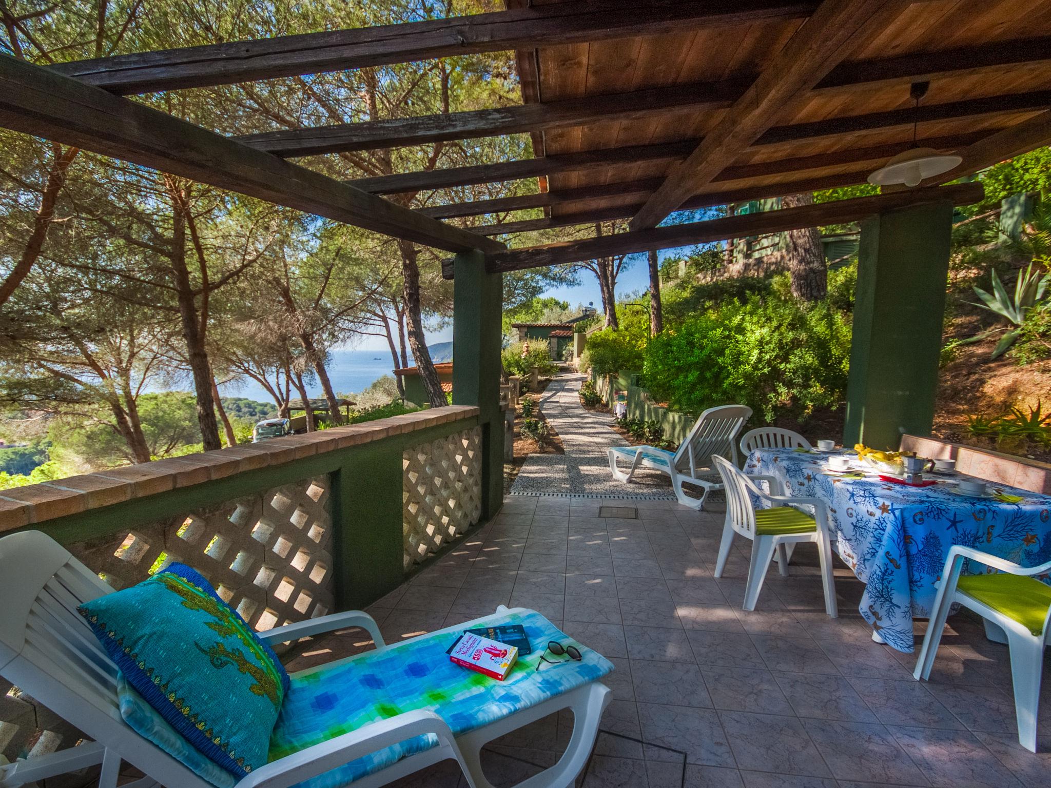 Foto 1 - Casa de 2 quartos em Capoliveri com jardim e vistas do mar