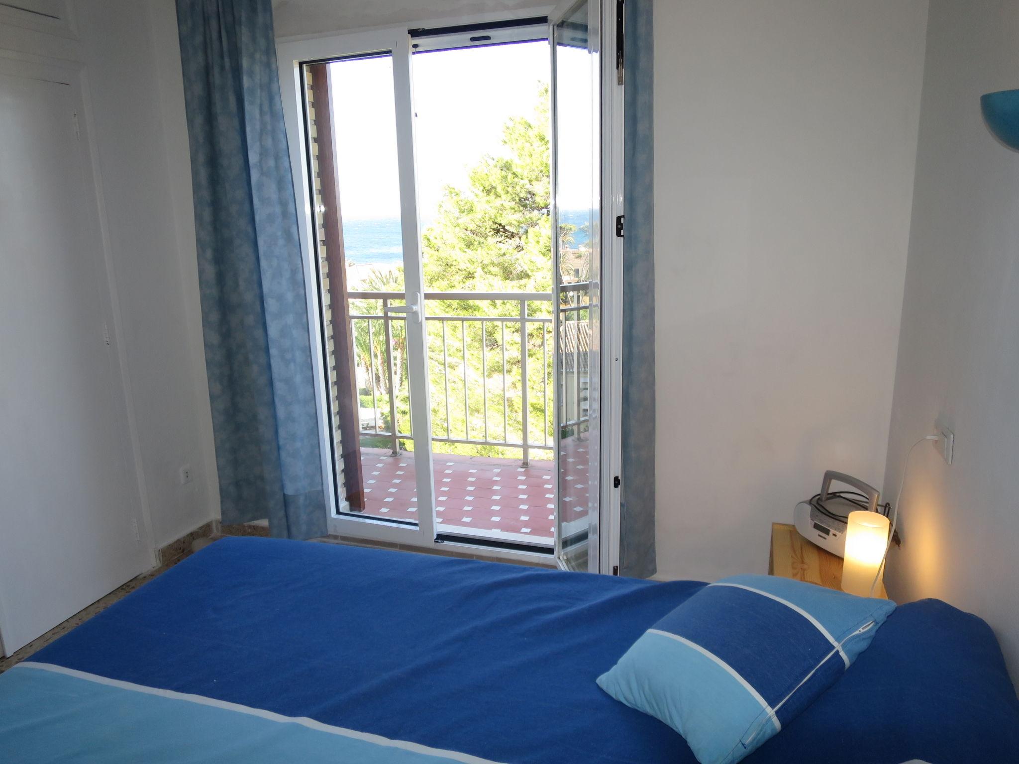 Foto 5 - Appartamento con 2 camere da letto a Dénia con piscina e vista mare