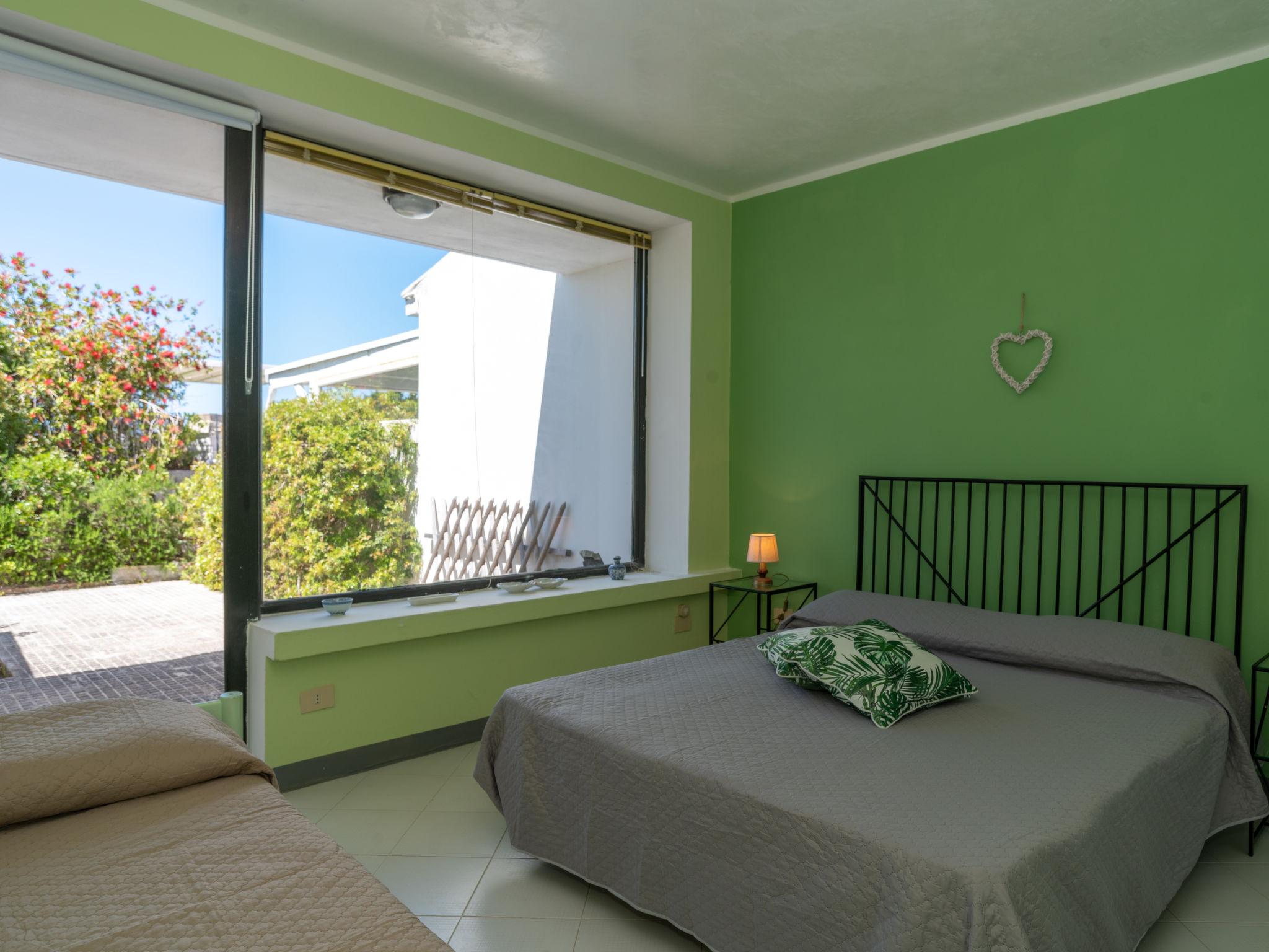Foto 9 - Casa con 2 camere da letto a Stintino con giardino e vista mare