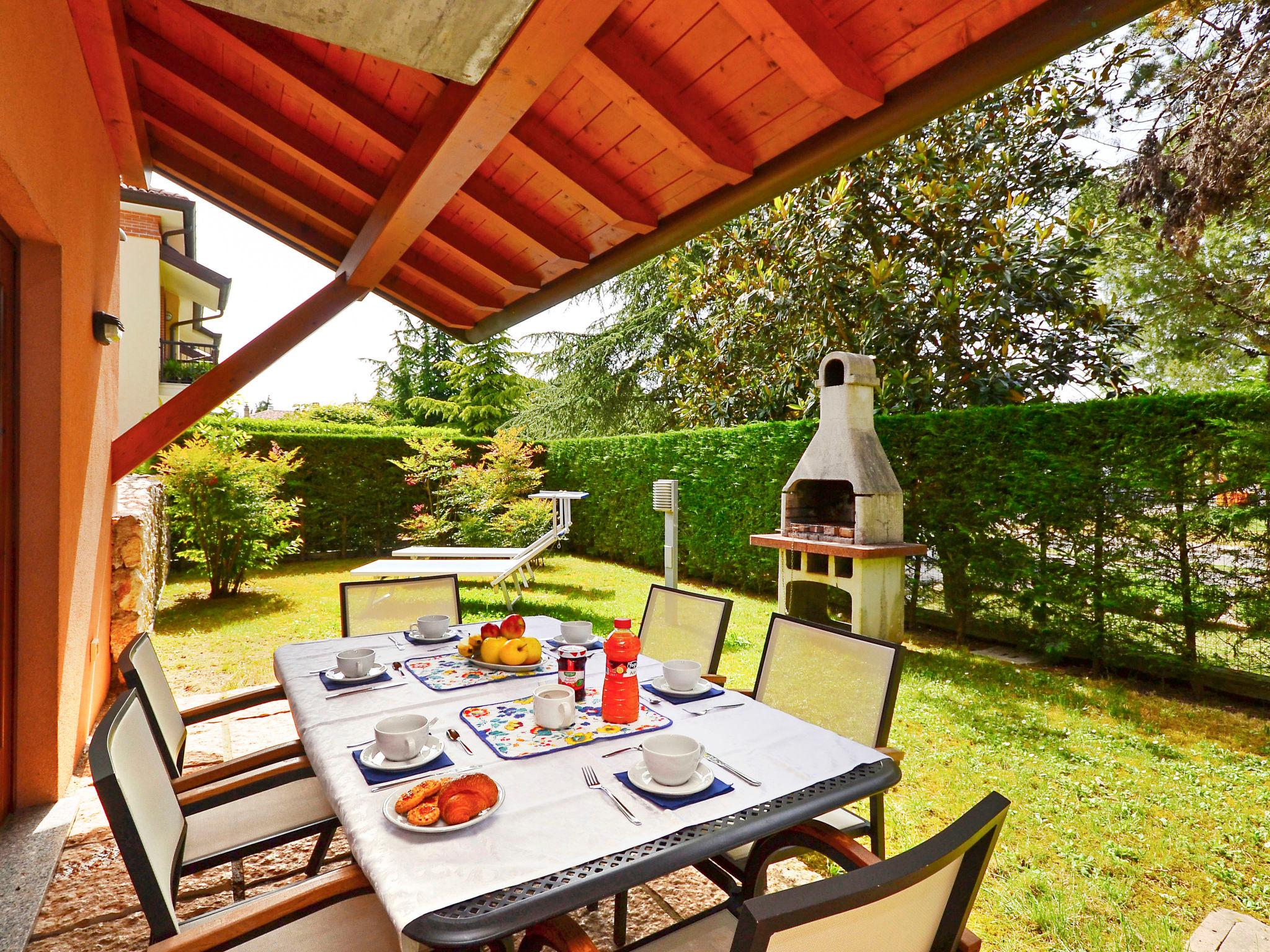 Foto 2 - Casa con 3 camere da letto a Lignano Sabbiadoro con piscina e giardino