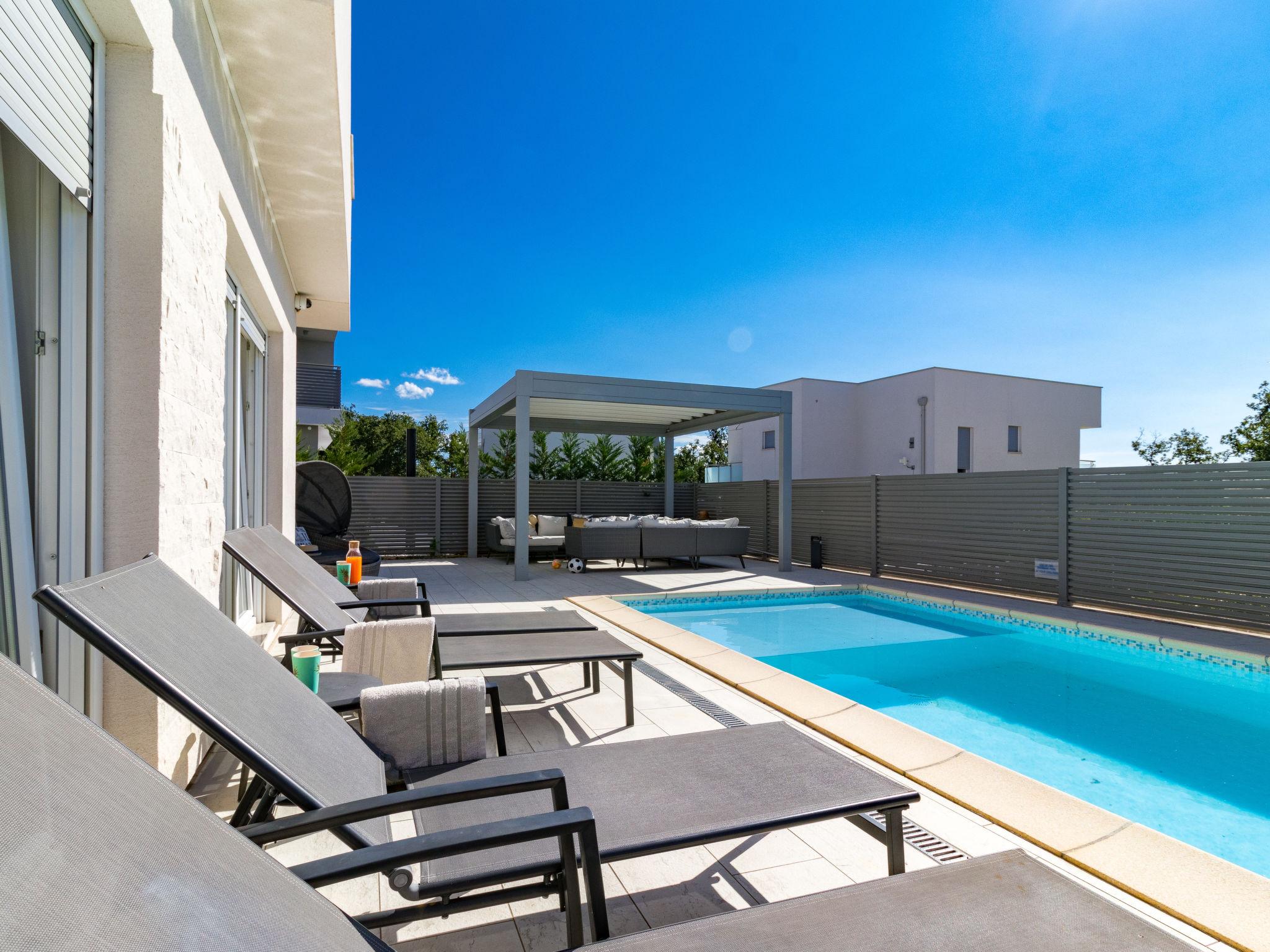 Photo 30 - Maison de 3 chambres à Brtonigla avec piscine privée et vues à la mer