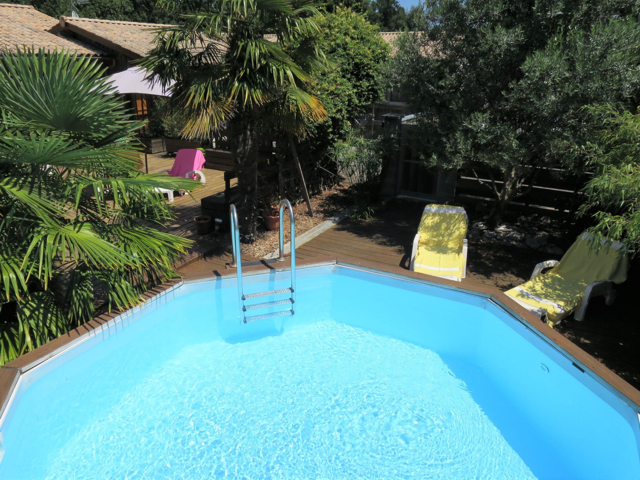 Foto 24 - Casa de 3 quartos em Le Porge com piscina privada e vistas do mar