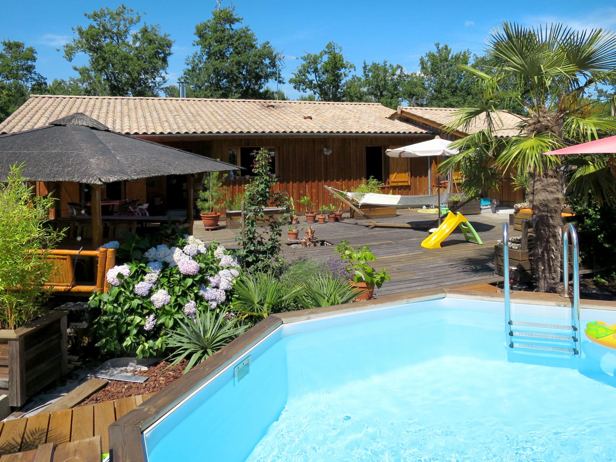 Foto 1 - Casa de 3 habitaciones en Le Porge con piscina privada y vistas al mar