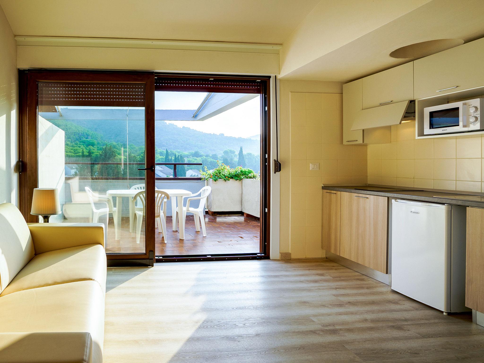 Photo 4 - Maison de 1 chambre à Castiglione della Pescaia avec piscine et jardin