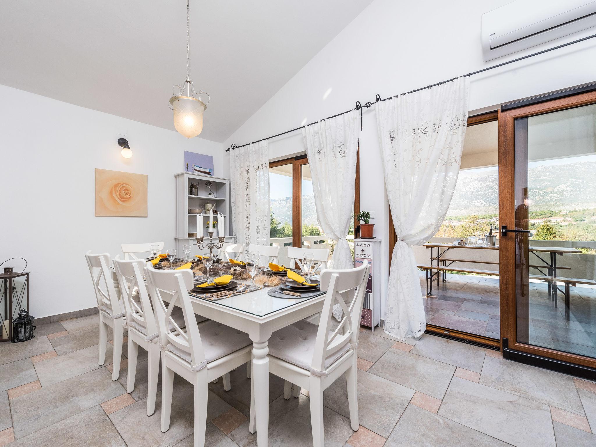 Photo 10 - Maison de 4 chambres à Jasenice avec piscine privée et vues à la mer