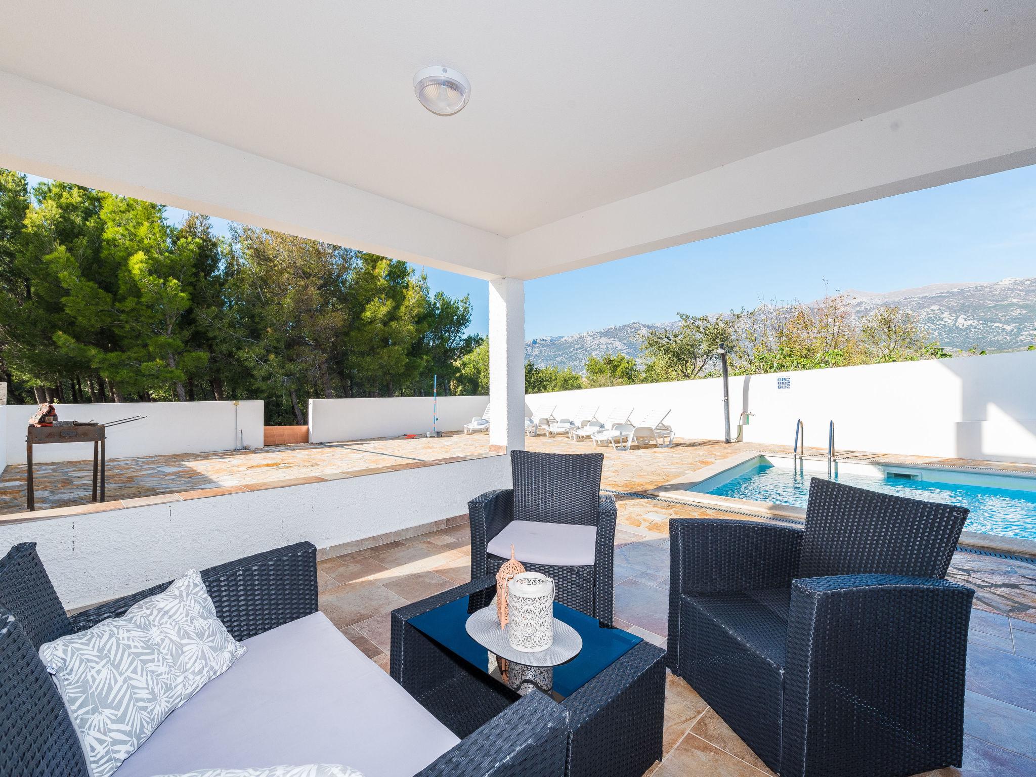 Photo 36 - Maison de 4 chambres à Jasenice avec piscine privée et vues à la mer