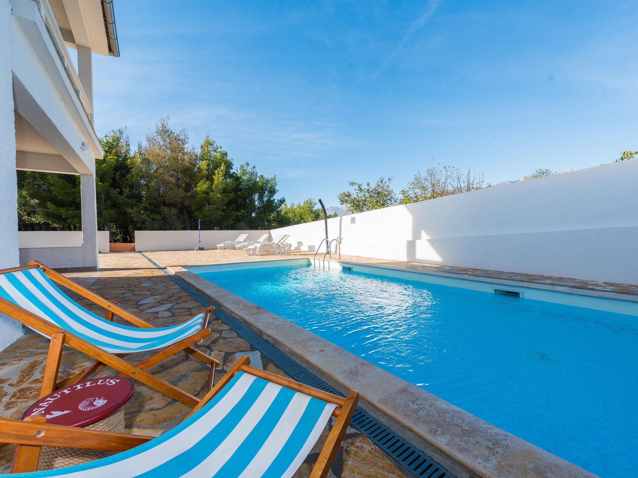 Photo 39 - Maison de 4 chambres à Jasenice avec piscine privée et vues à la mer