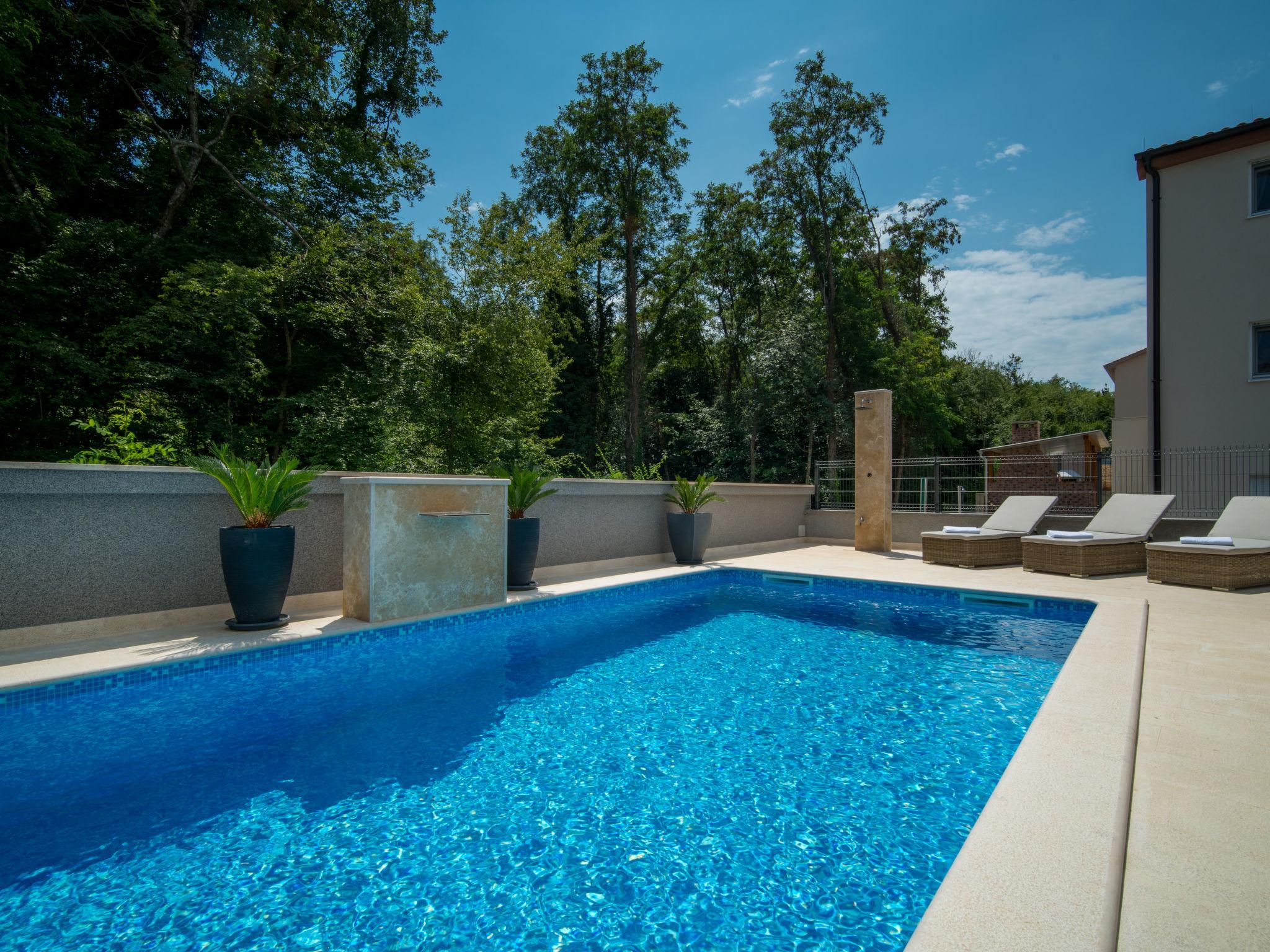 Photo 13 - Maison de 4 chambres à Dobrinj avec piscine privée et vues à la mer