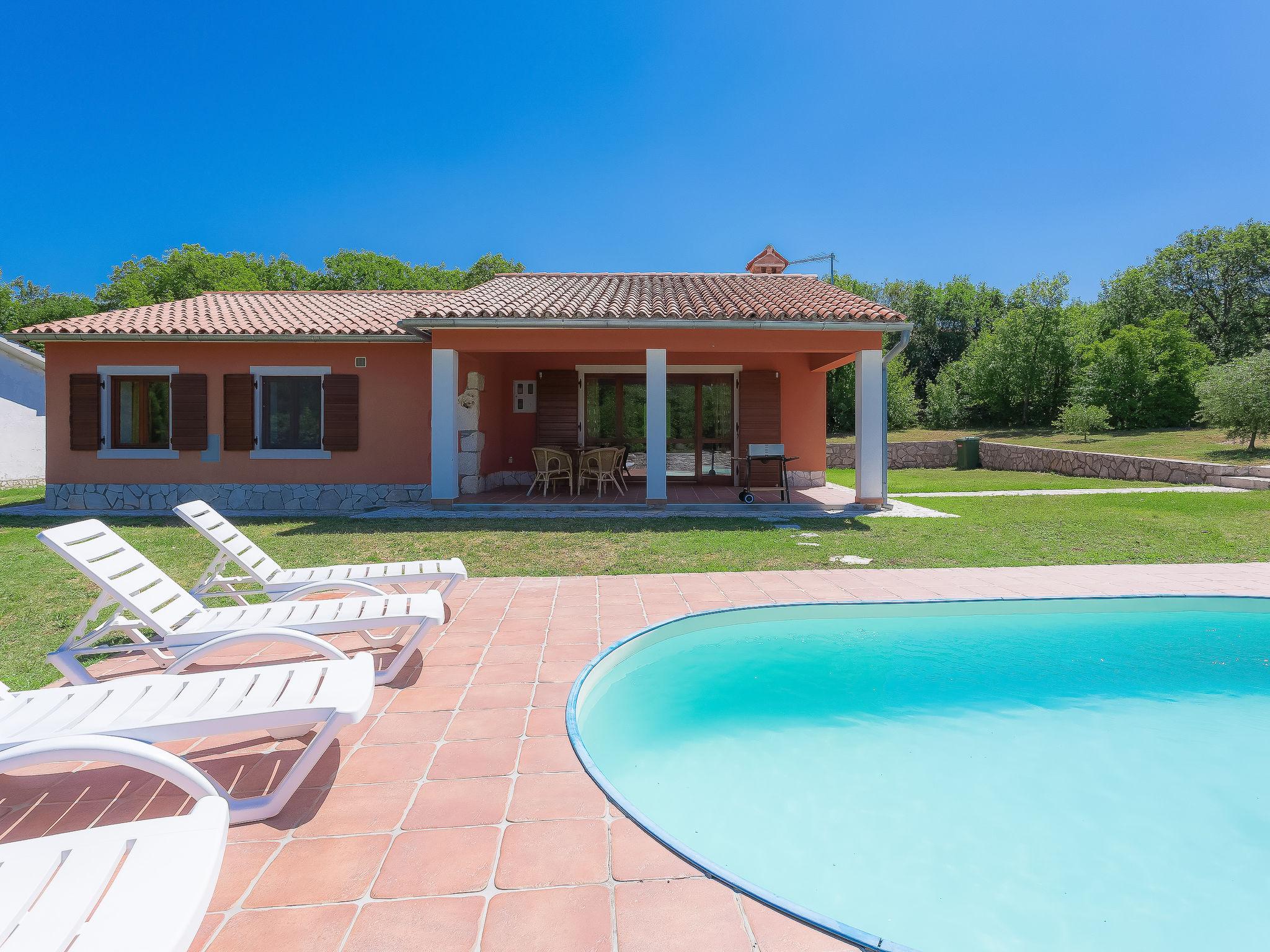 Photo 1 - Maison de 2 chambres à Raša avec piscine privée et vues à la mer