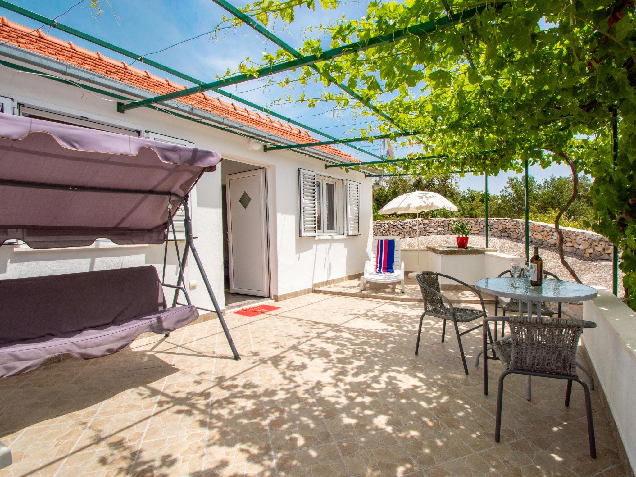 Photo 3 - Maison de 1 chambre à Rogoznica avec terrasse et vues à la mer