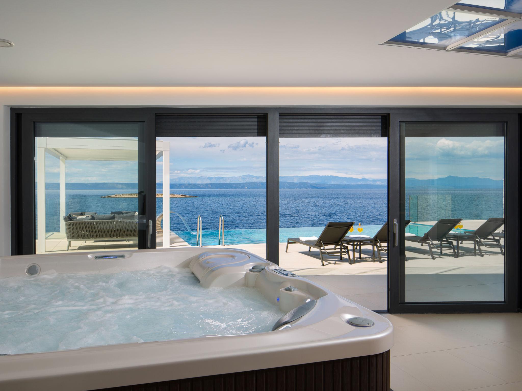 Foto 10 - Casa de 4 quartos em Blato com piscina privada e vistas do mar