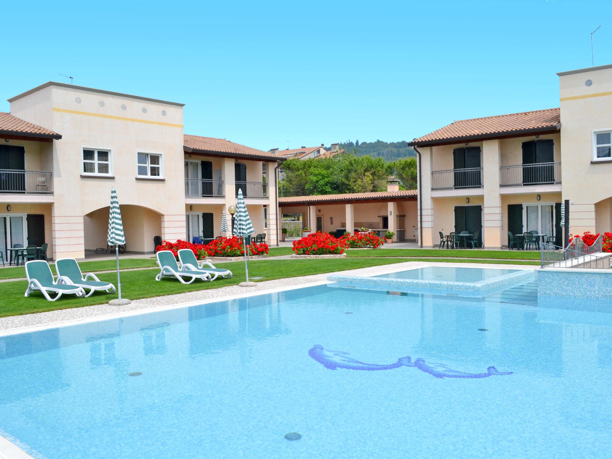 Foto 27 - Appartamento con 2 camere da letto a Garda con piscina e vista sulle montagne