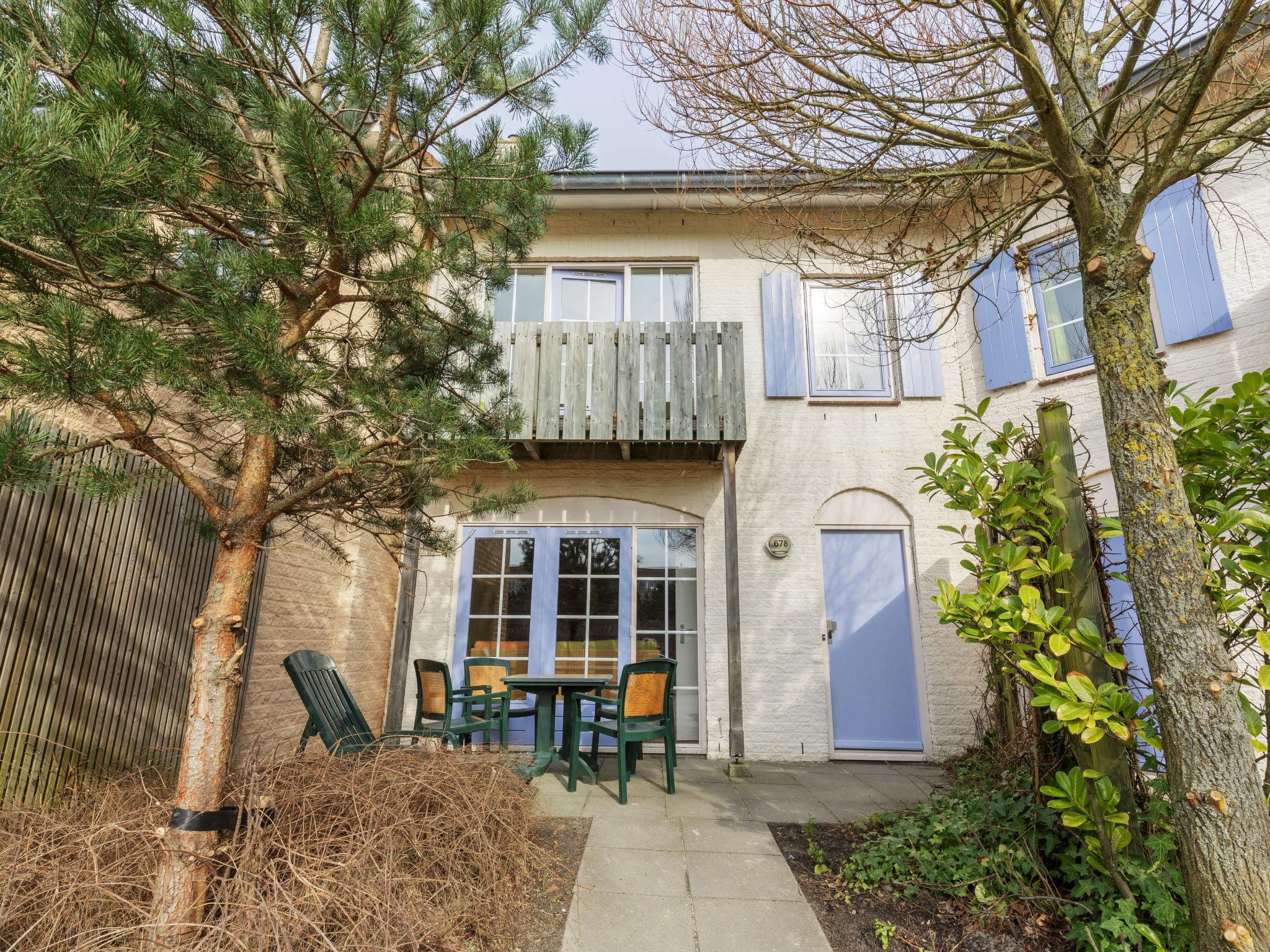 Photo 1 - Maison de 2 chambres à Ouddorp avec piscine et jardin