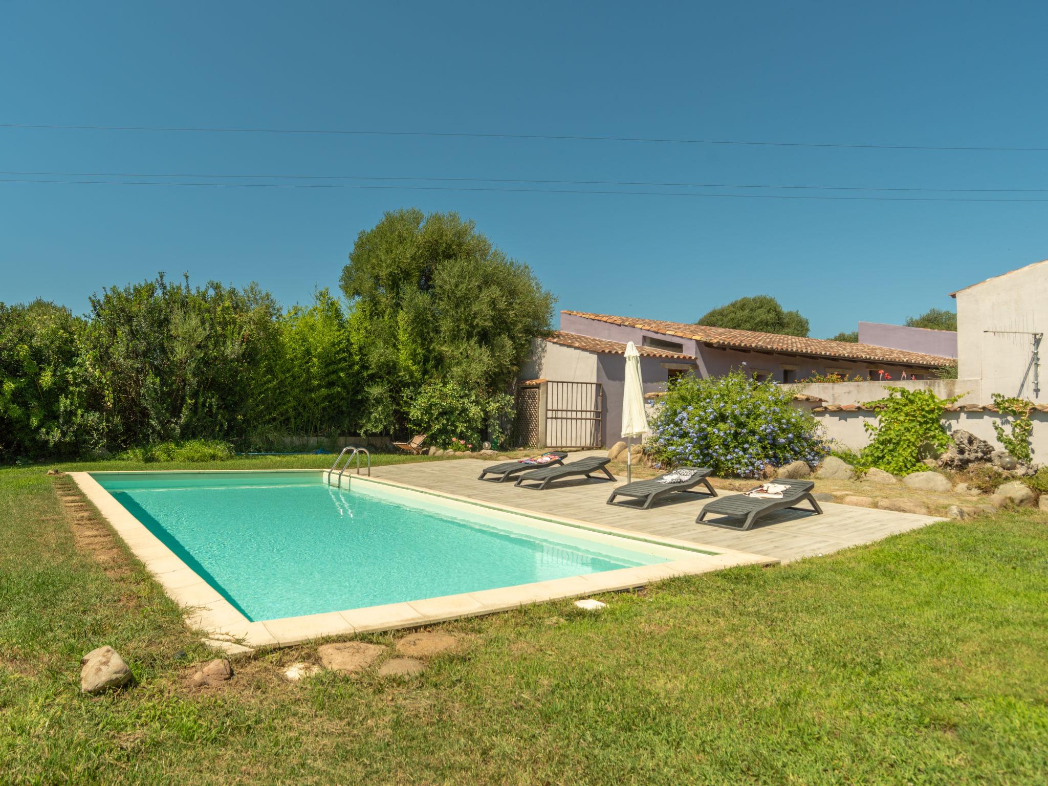 Photo 1 - Maison de 5 chambres à Viddalba avec piscine privée et vues à la mer