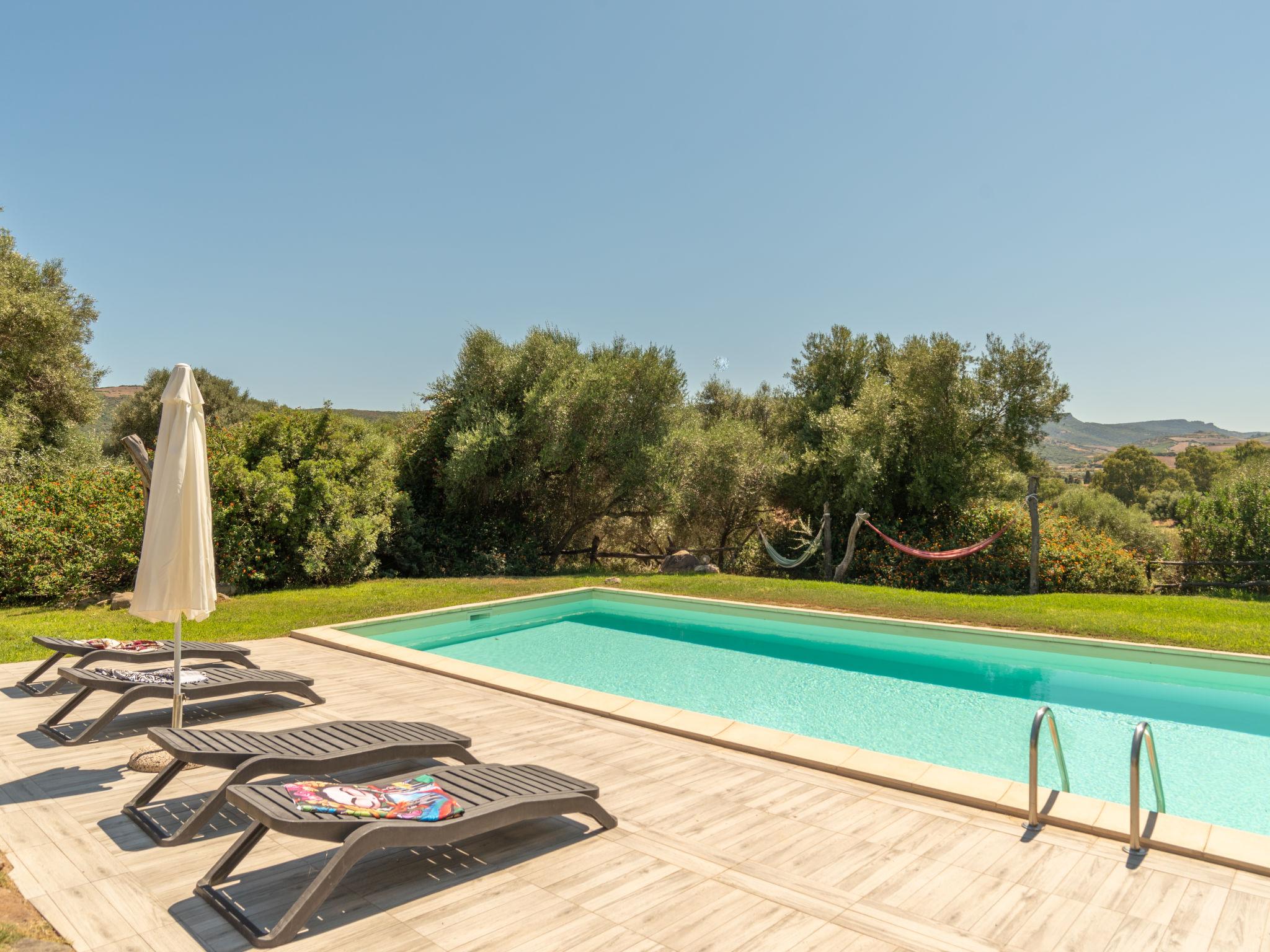 Photo 32 - Maison de 5 chambres à Viddalba avec piscine privée et jardin