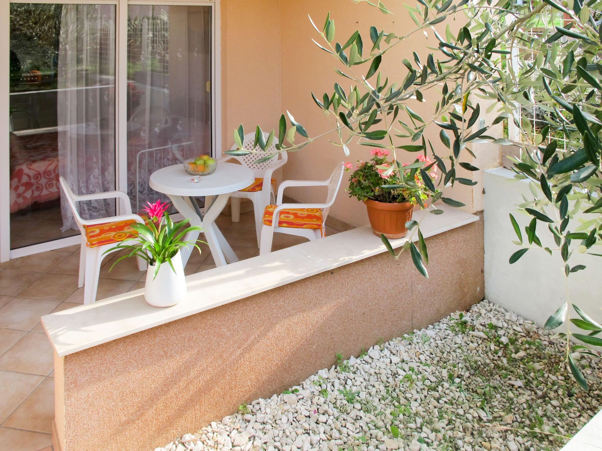 Photo 1 - Appartement en Pula avec jardin et terrasse