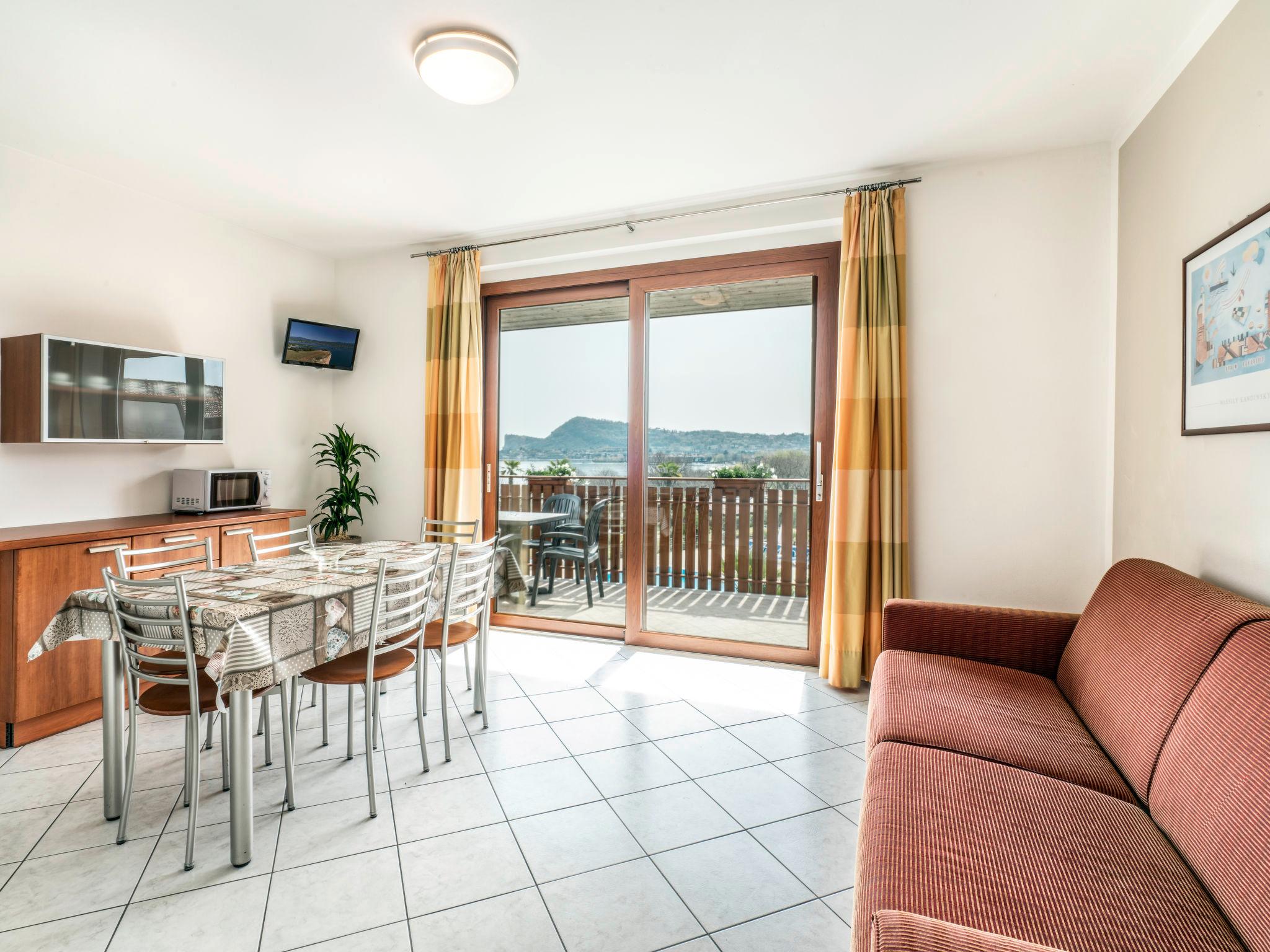 Foto 4 - Apartamento de 1 quarto em Manerba del Garda com piscina e vista para a montanha