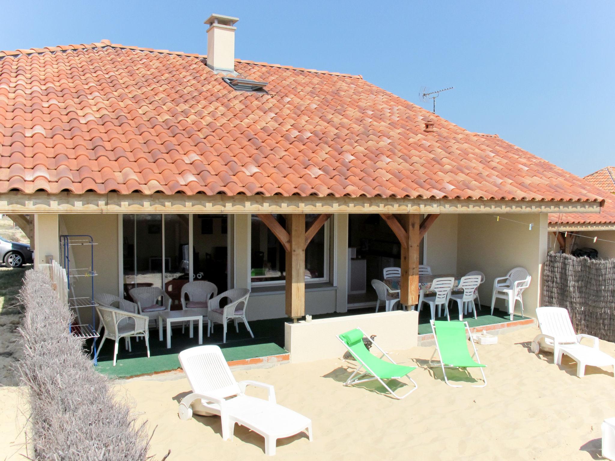 Photo 1 - Maison de 4 chambres à Saint-Julien-en-Born avec terrasse et vues à la mer