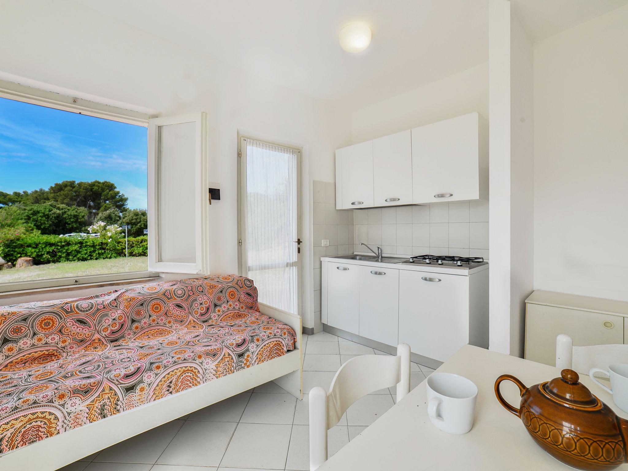 Foto 7 - Apartamento de 1 habitación en Capoliveri con jardín y vistas al mar