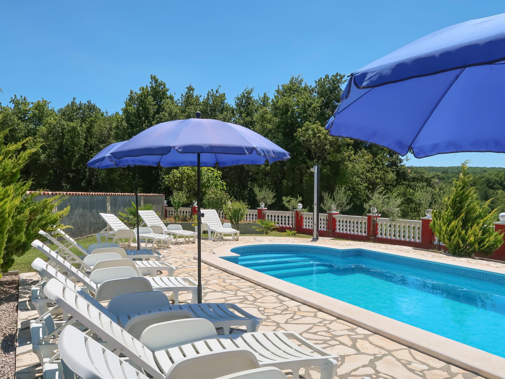 Photo 4 - Maison de 6 chambres à Labin avec piscine privée et vues à la mer