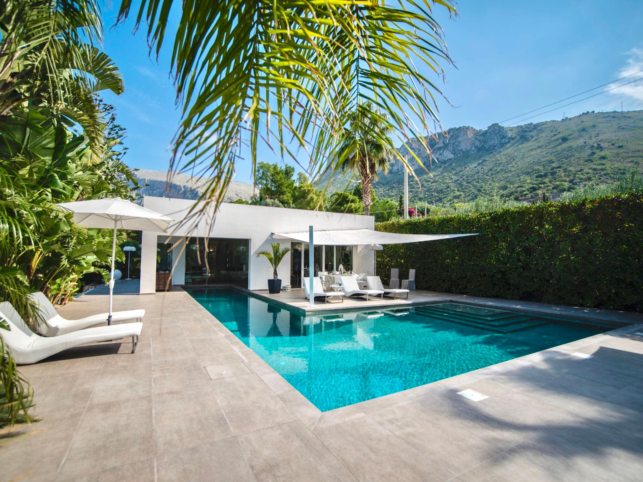 Foto 1 - Casa de 2 habitaciones en Terrasini con piscina privada y jardín