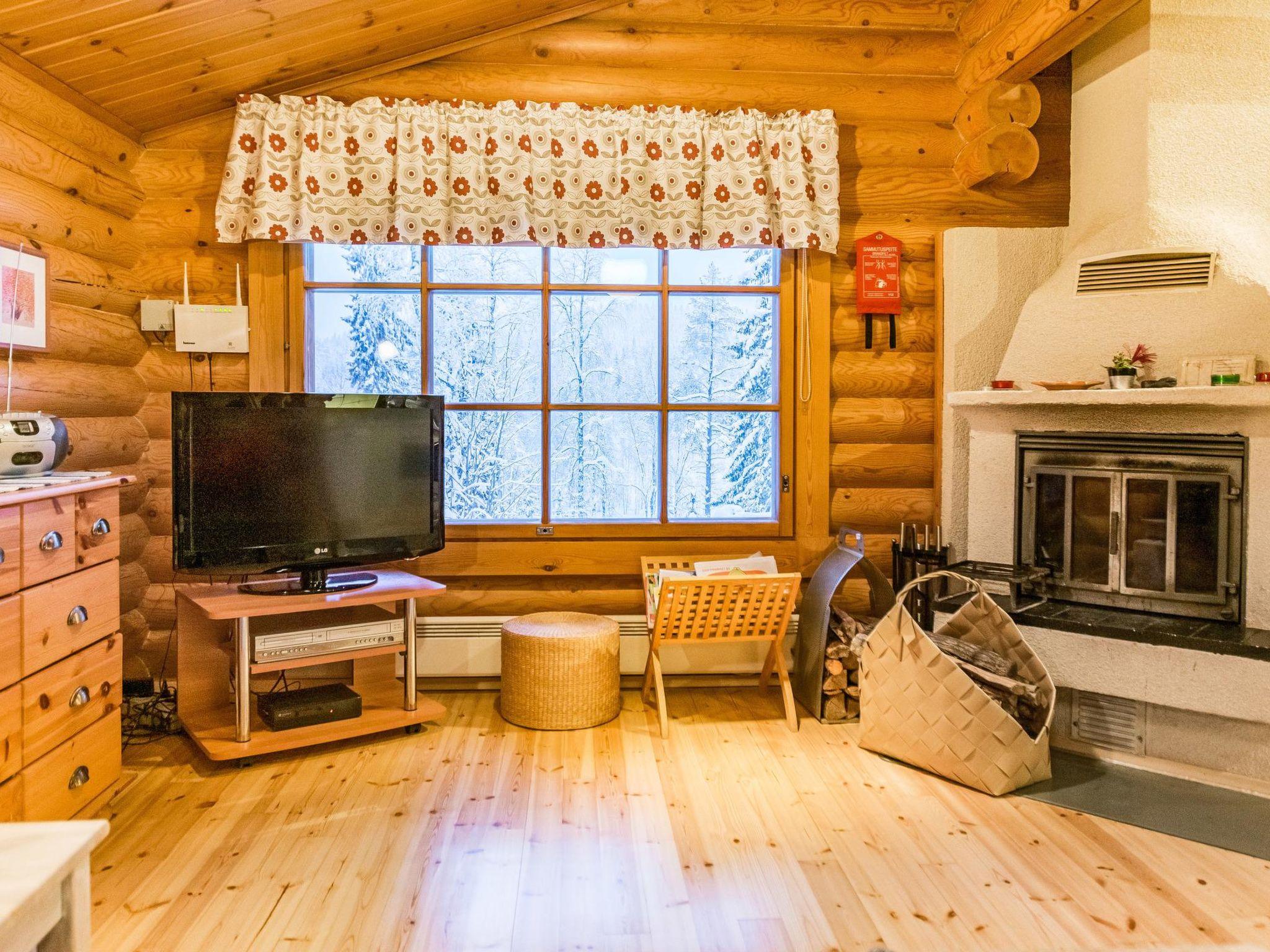 Foto 6 - Haus mit 1 Schlafzimmer in Puolanka mit sauna und blick auf die berge