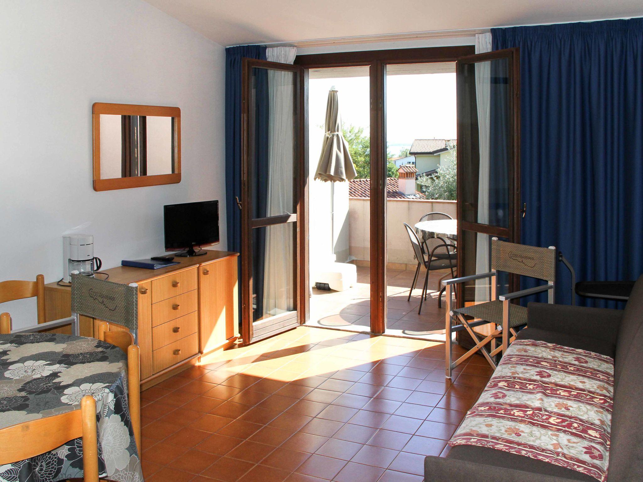 Foto 5 - Apartamento de 1 habitación en Moniga del Garda con piscina y vistas a la montaña