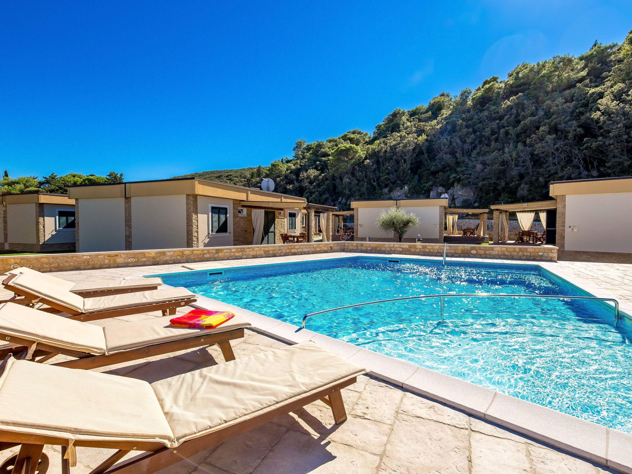 Photo 24 - Maison de 2 chambres à Rab avec piscine et terrasse