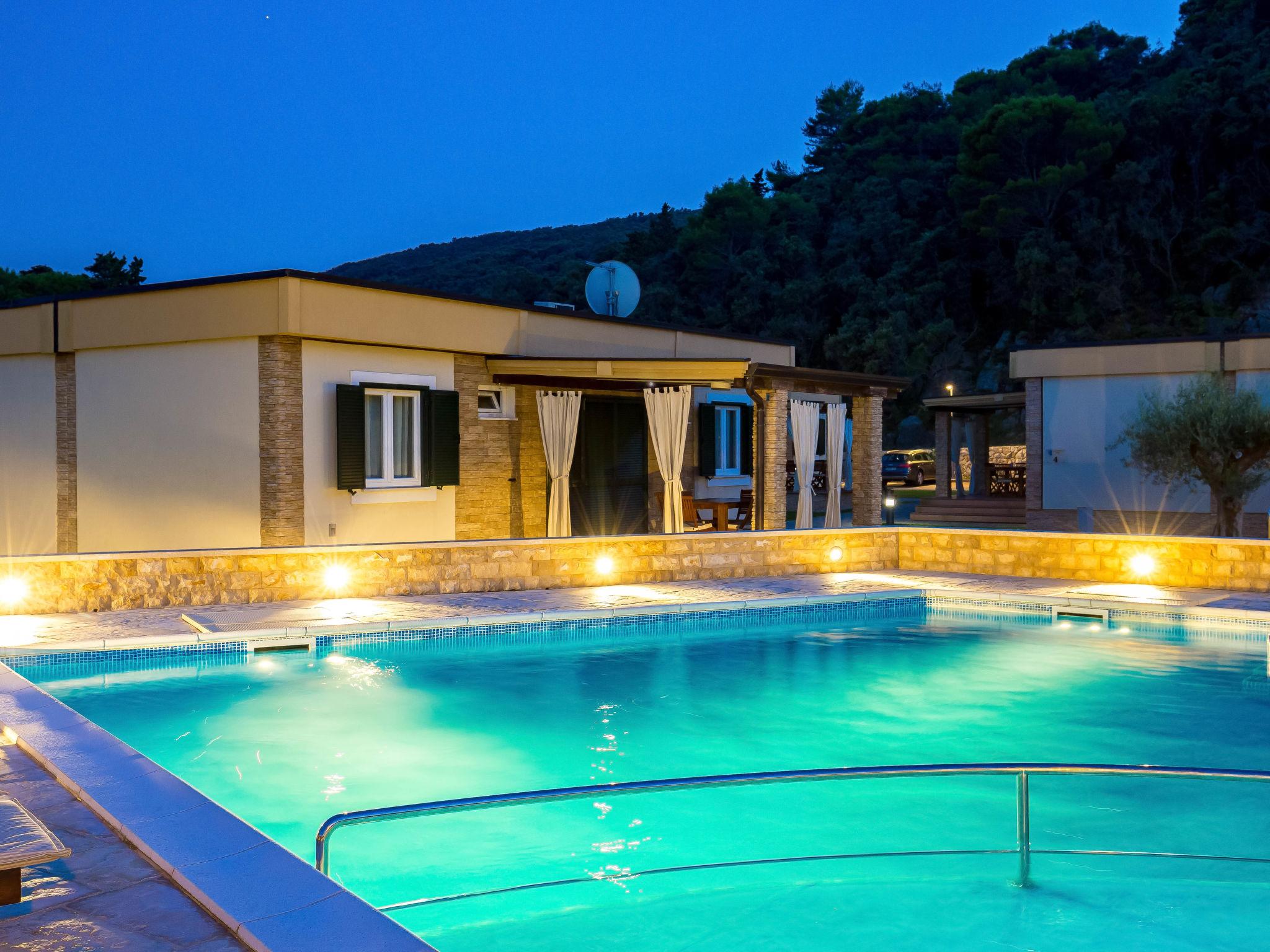 Photo 30 - Maison de 2 chambres à Rab avec piscine et terrasse