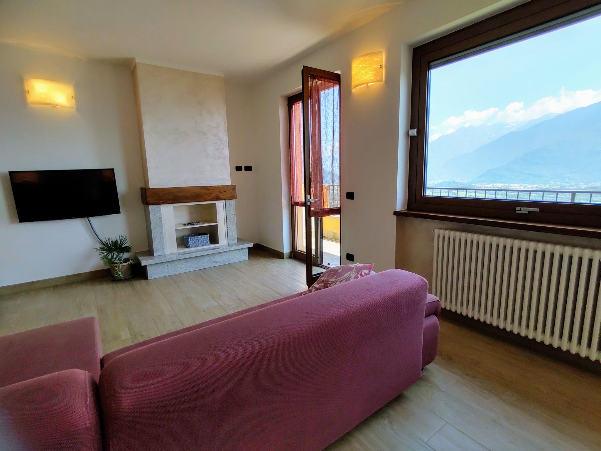 Foto 9 - Appartamento con 3 camere da letto a Trezzone con terrazza e vista sulle montagne