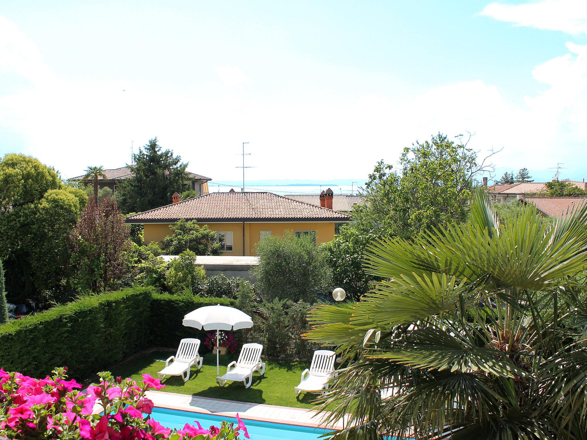 Foto 11 - Appartamento con 2 camere da letto a Lazise con piscina e vista sulle montagne