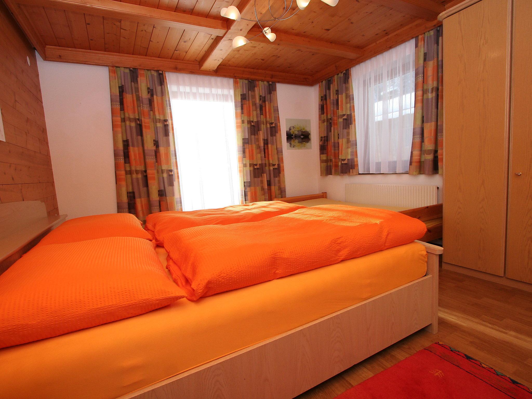 Foto 11 - Appartamento con 3 camere da letto a Aschau im Zillertal con giardino