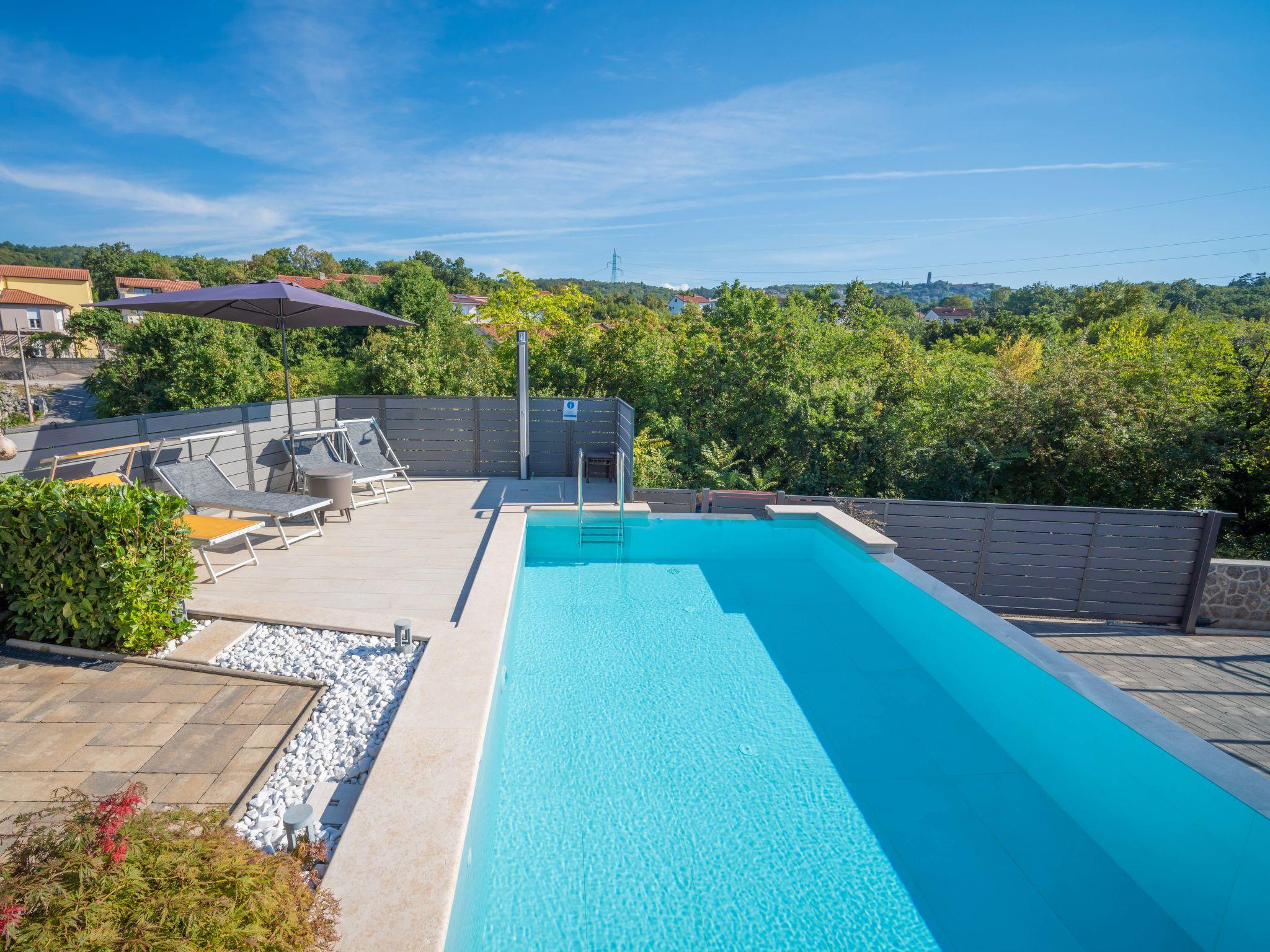 Foto 12 - Appartamento con 2 camere da letto a Matulji con piscina e giardino