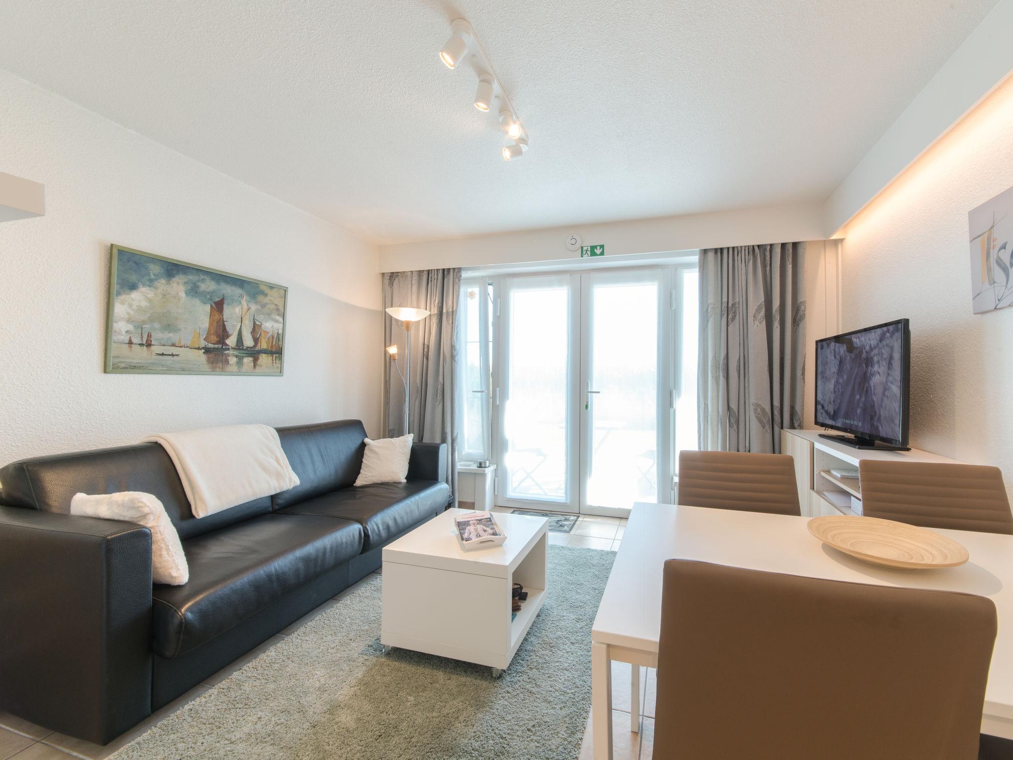 Foto 2 - Appartamento con 1 camera da letto a De Haan con piscina privata e vista mare