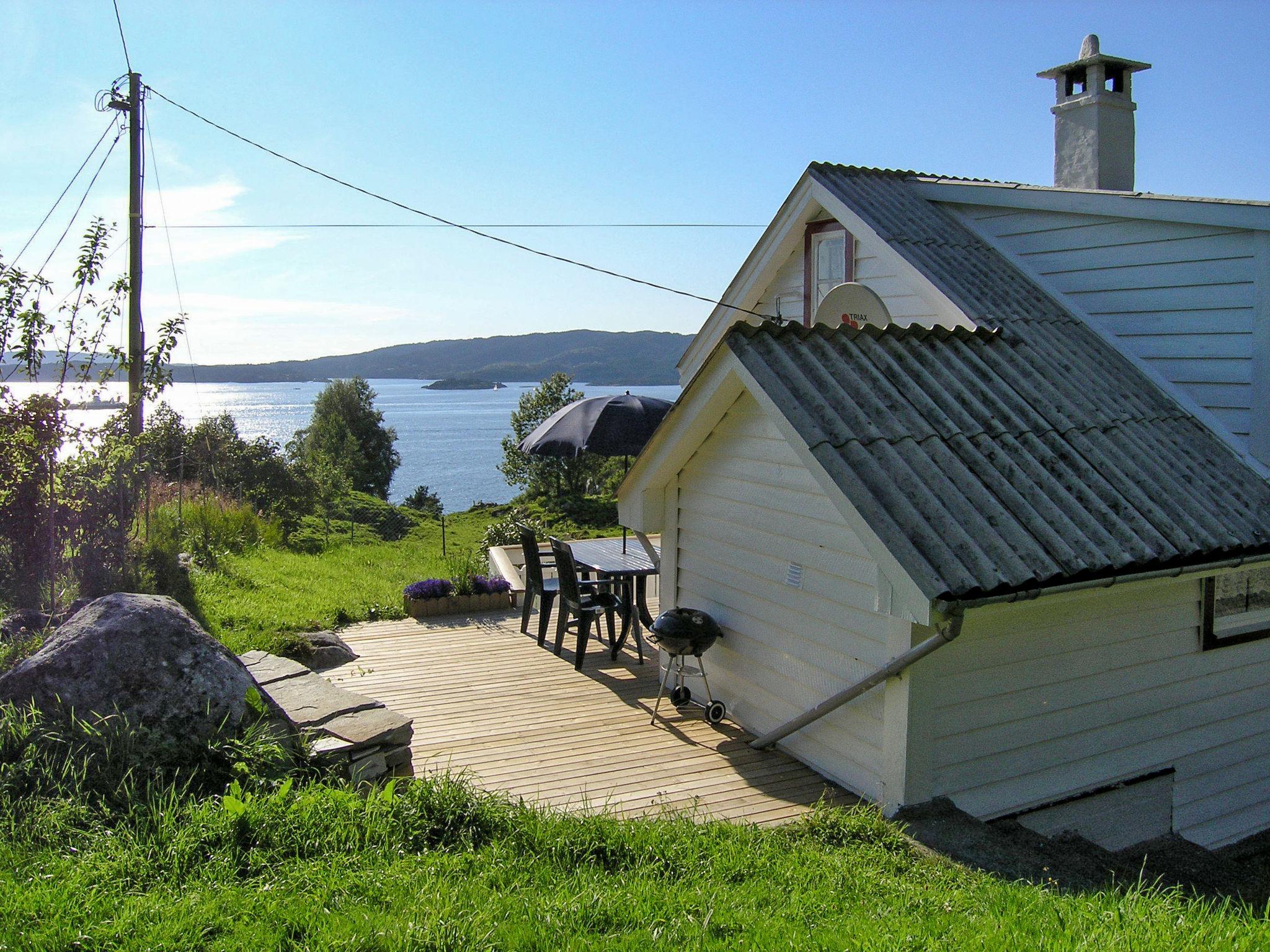 Photo 1 - Maison de 3 chambres à Tysnes avec jardin et terrasse