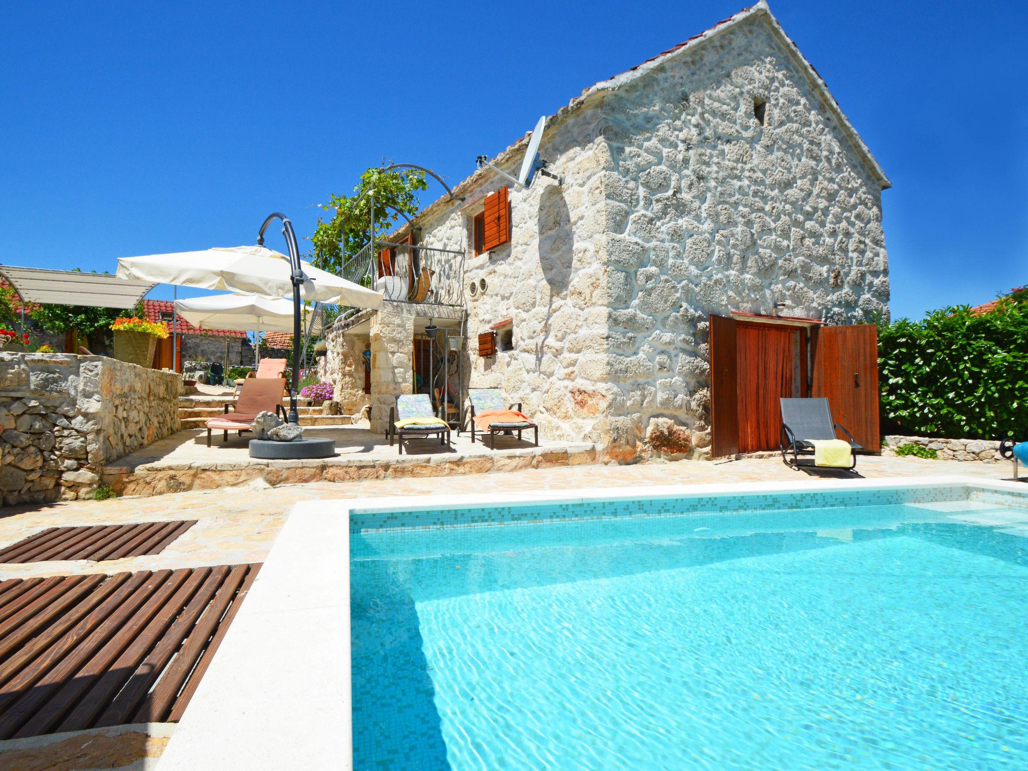 Photo 1 - Maison de 1 chambre à Marina avec piscine privée et jardin