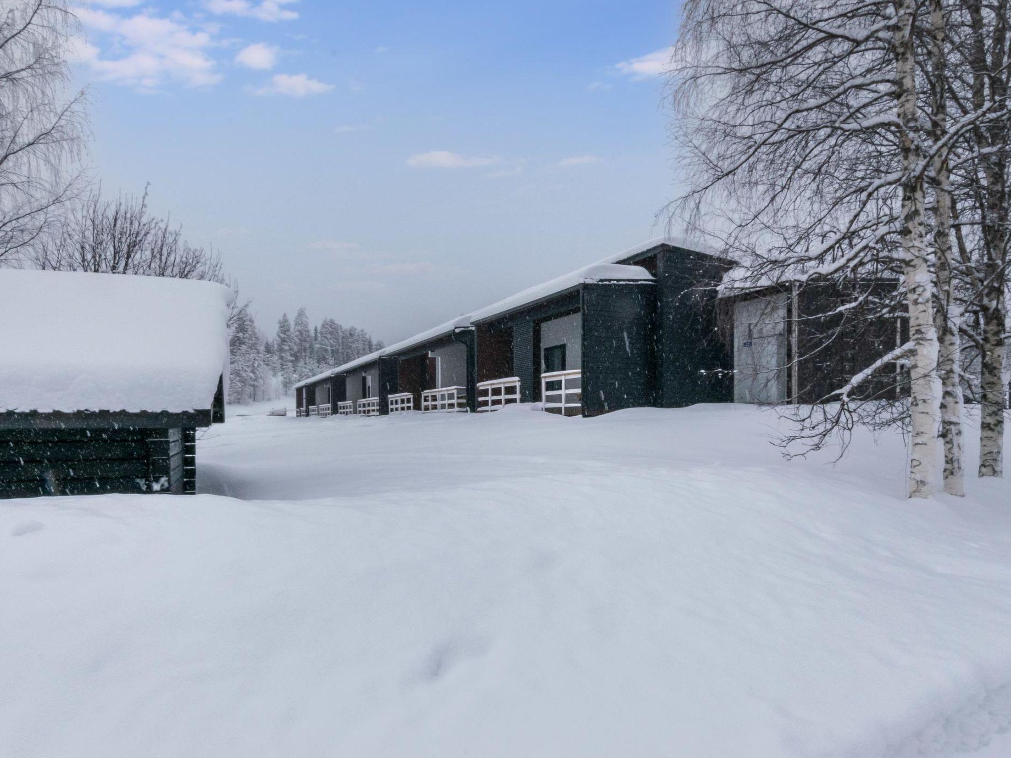 Foto 2 - Casa de 2 habitaciones en Puolanka con sauna y vistas a la montaña