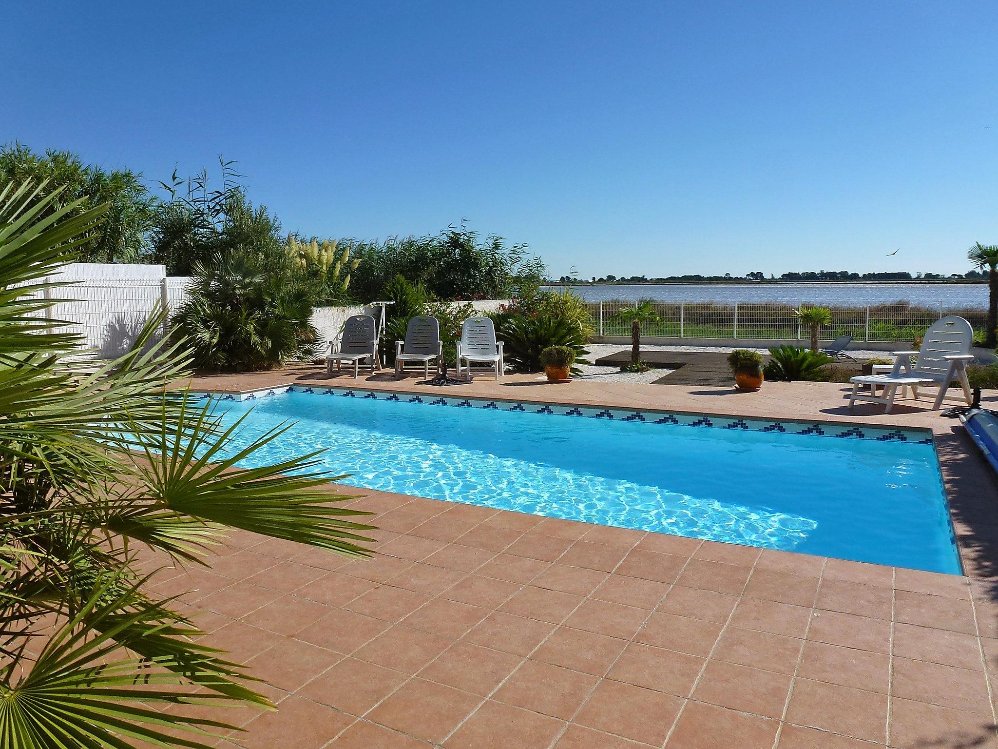 Foto 2 - Casa de 5 habitaciones en Le Grau-du-Roi con piscina privada y vistas al mar