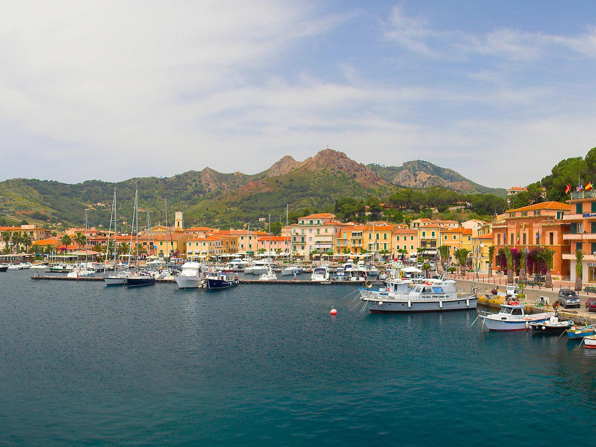 Foto 13 - Apartamento de 1 habitación en Porto Azzurro con jardín y vistas al mar