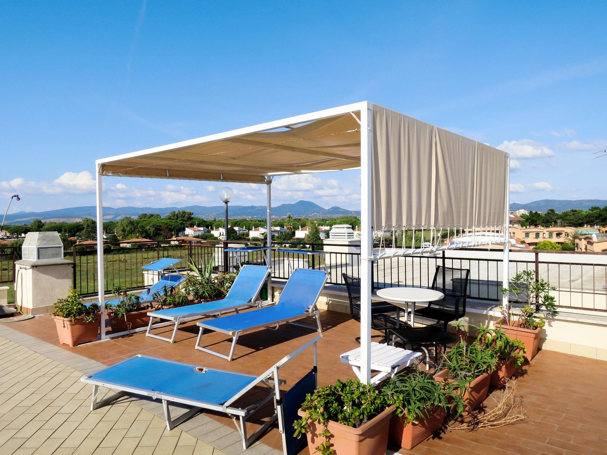 Foto 2 - Apartamento de 2 habitaciones en Cerveteri con jardín y vistas al mar